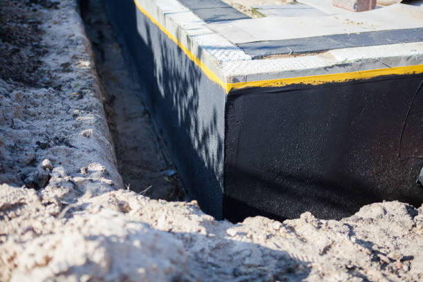 Professional Exterior Waterproofing technician working in Laurel, IN